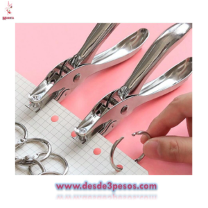 Perforadora de metal XING LI 13 x 5cm. En blister