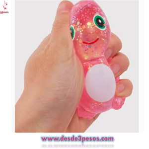 Squishi Dinosaurio con Glitter en colores caja con 12pza. Precio por 1pza. 8 x 7cm.