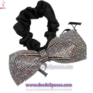Dona con Resorte negra y Moño Cubierto de pedrería 6 tonos 9 x 3. cm.