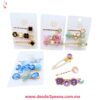 Pasadores y pinzas para el cabello con aplicaciones de perlas sintéticas, pedrería brillante y detalles florales en tonos variados 7 x 3 cm. 25N-23 - Foto 1