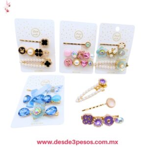 Pasadores y pinzas para el cabello con aplicaciones de perlas sintéticas, pedrería brillante y detalles florales en tonos variados 7 x 3 cm. 25N-23