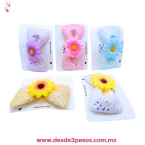 Pico de garza en forma de Moño con destellos y girasol decorativa en el centro 11 x 6 cm. 6C-111