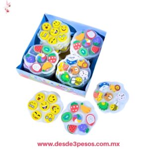 Estuche con 7 gomas surtidas en forma de emojis, frutas y animales, presentadas en cajitas plásticas redondas con divisiones. 11 X 11 cm. YONG-517
